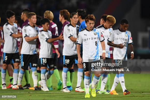 Hiroyuki Abe and Kawasaki Frontale players show frustration after their 2-2 draw in the J.League J1 match between Ventforet Kofu and Kawasaki...