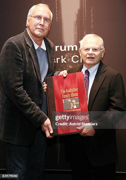 Actor Chevy Chase and photographer Steve Schapiro attend "The Godfather Family Album" book launch presented by Men's Vogue and Audi at Audi Forum New...