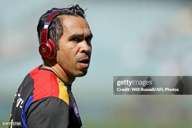 Eddie Betts of the Crows warms up before during the round 23 AFL match between the West Coast Eagles and the Adelaide Crows at Domain Stadium on...