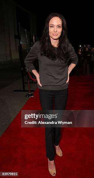 Angelina Jolie arrives on the red carpet for the Los Angeles premiere of "Gran Torino" at the Steven J. Ross Theater on The Warner Bros. Lot on...