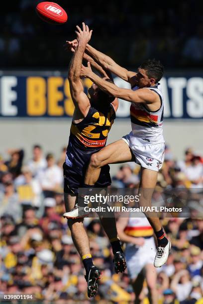 Shannon Hurn of the Eagles and Charlie Cameron of the Crows go for the mark during the round 23 AFL match between the West Coast Eagles and the...