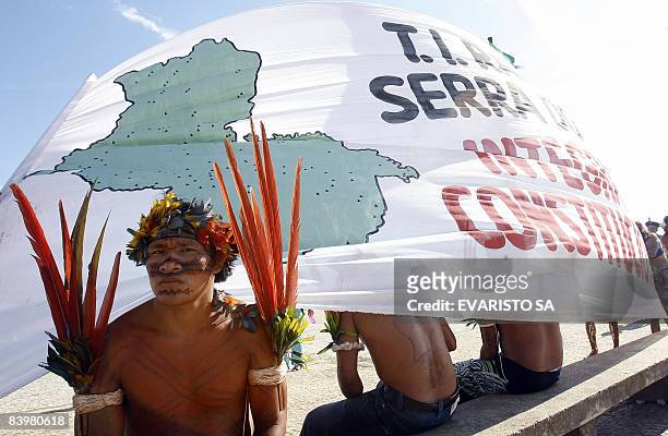 Brazilian natives from the Macuxi tribe stand by in front at the supreme court in Brasilia on December 10, 2008 awaiting for the outcome the...