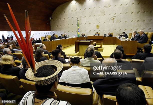 Brazilian natives from the Patamona tribe attend the trial on the Raposa Serra do Sol indigenous reservation in the Supreme Court in Brasilia on...