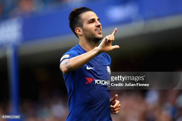 Cesc Fabregas of Chelsea celebrates scoring his sides first goal during the Premier League match between Chelsea and Everton at Stamford Bridge on...