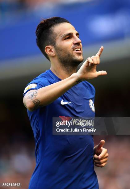 Cesc Fabregas of Chelsea celebrates scoring his sides first goal during the Premier League match between Chelsea and Everton at Stamford Bridge on...