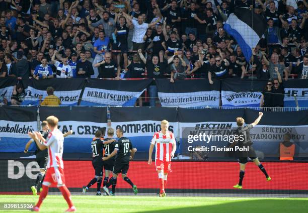 Konstantin Kerschbaumer, Andreas Voglsammer, Manuel Prietl and Patrick Weihrauch of Arminia Bielefeld celebrate after scoring the 0:1 during the game...