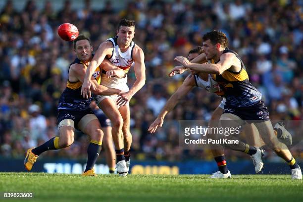 Sam Mitchell of the Eagles and Brad Crouch of the Crows contest for the ball during the round 23 AFL match between the West Coast Eagles and the...