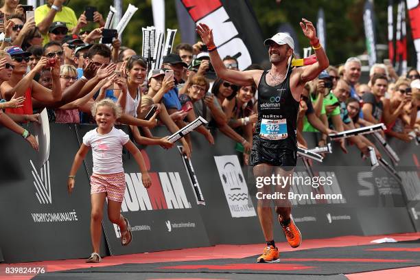 Bruno Clerbout of Belgium celebrates winning the IRONMAN Vichy on August 27, 2017 in Vichy, France.