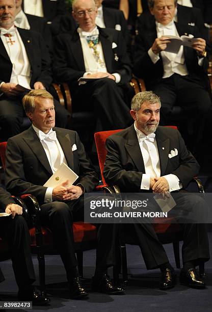 Nobel economy prize laureate Paul Krugman of the United States and literature laureate Jean-Marie Le Clezio of France attend the awards ceremony in...