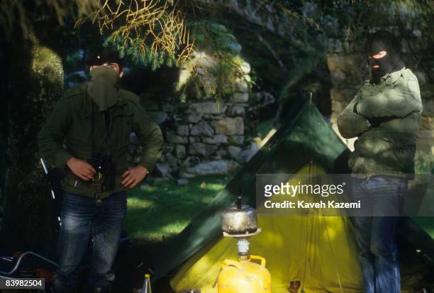 Trainee members of the Provisional Irish Republican Army at a camp set up during a guerilla warfare training session in a secret location in the...