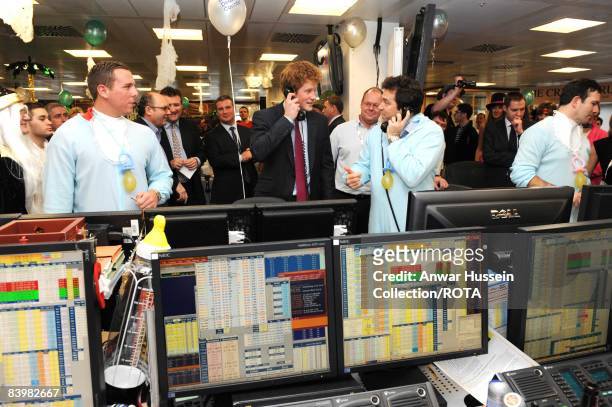 Prince Harry meets brokers at the offices of city traders ICAP on December 10, 2008 in London, England. The Prince attended the 16th ICAP Charity...