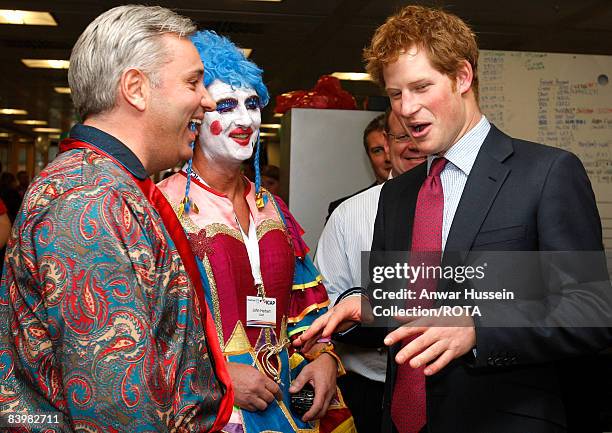 Prince Harry shares a joke with brokers at the offices of city traders ICAP on December 10, 2008 in London, England. The Prince attended the 16th...