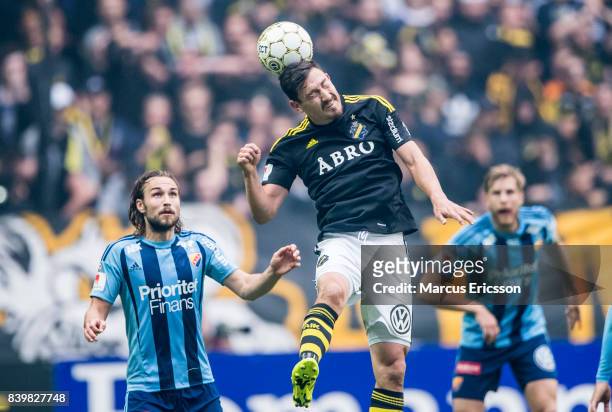 Kevin Walker of Djurgardens IF and Stefan Ishizaki of AIK during the Allsvenskan match between AIK and Djurgardens IF at Friends arena on August 27,...