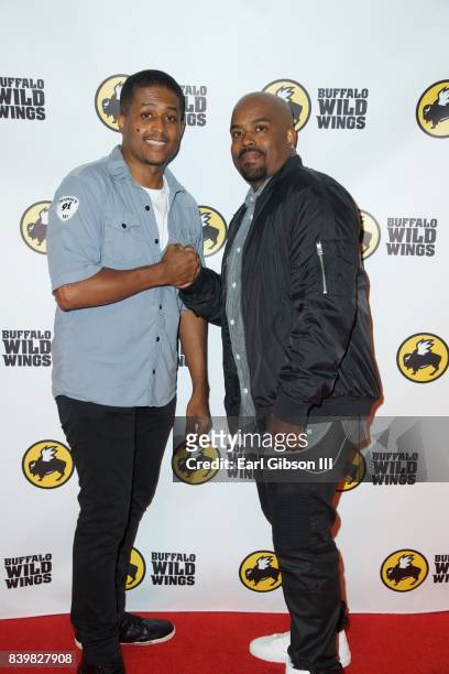 Actors Lahmard Tate and Larron Tate attend the Buffalo Wild Wings Opening In Koreatown at Buffalo Wild Wings on August 26, 2017 in Los Angeles,...