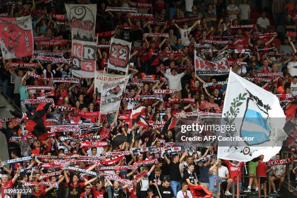 Guingamp supporters cheer during the French Ligue 1 football match between Guingamp and Strasbourg on August 27, 2017 at the Roudourou stadium in...