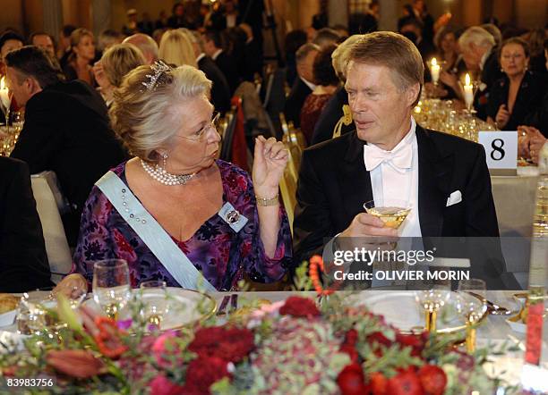 The 2008 Nobel Prize literature laureate Jean-Marie Le Clezio of France speaks with Princess Kristina of Sweden during the Banquet at the city-Hall...