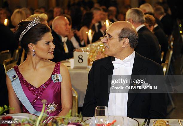 The 2008 Nobel laureate of Chemistry Martin Chalfie from France speaks with Princess Victoria of Sweden during the Banquet at the city-Hall of...