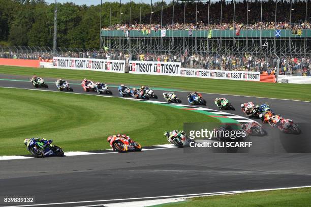 Movistar Yamaha MotoGP's Italian rider Valentino Rossi leads at Becketts during the MotoGP race of the British Grand Prix at Silverstone circuit in...