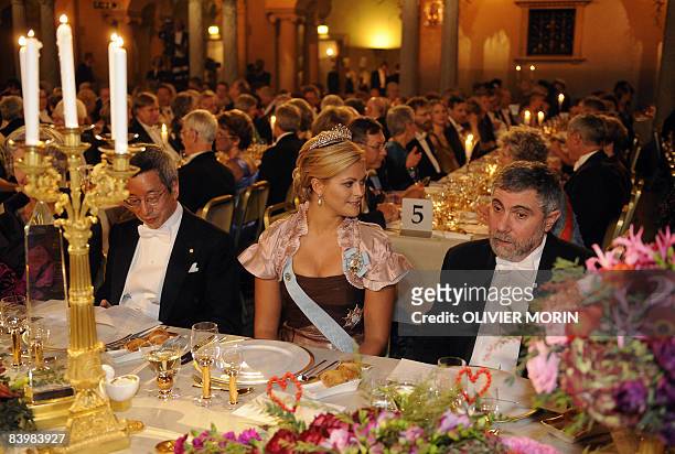 The 2008 Nobel laureate of Economy Paul Krugman speaks with Princess Madeleine during the Banquet at the city-Hall of Stockholm, December 10, 2008....