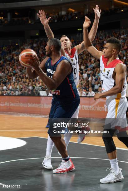 Boris Diaw of Team Frankreich, Daniel Theis of Team Germany and Maodo Lo of Team Germany during the game between Germany and France on august 27,...