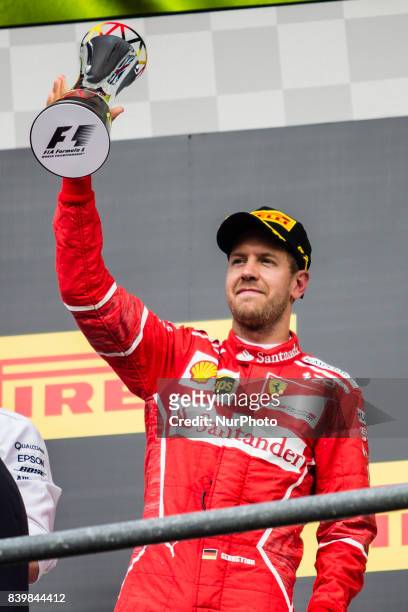 Sebastian from Germany of scuderia Ferrari celebrating his second place during the Formula One Belgian Grand Prix at Circuit de Spa-Francorchamps on...