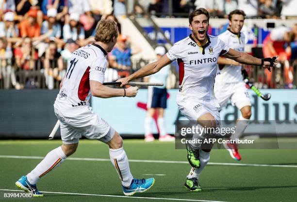 Amaury Keusters and Cedric Charlier of Belgium celebrate their second goal during the men's final match between The Netherlands and Belgium at The...