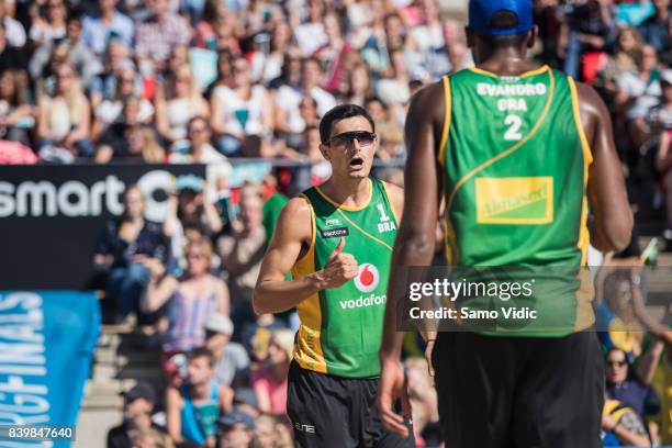 Andre Loyola Stein of Brazil reacts during the gold medal match against Phil Dalhausser and Nick Lucerna of the United States at the Swatch Beach...