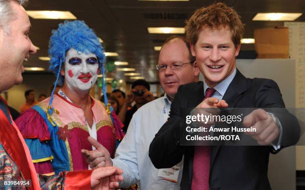 Prince Harry shares a joke with brokers at the offices of city traders ICAP on December 10, 2008 in London, England. The Prince attended the 16th...