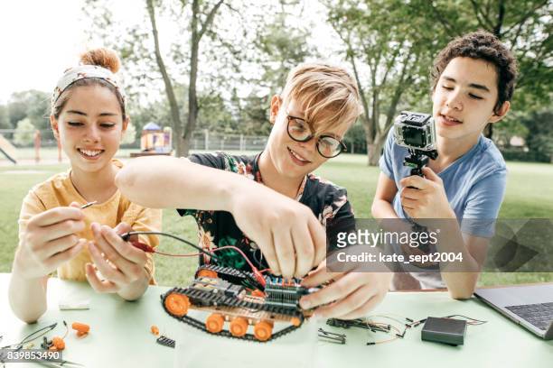 teens working on robotics project - plant stem stock pictures, royalty-free photos & images