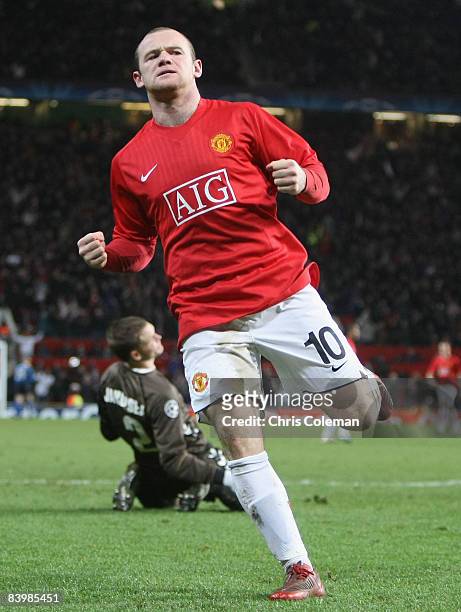 Wayne Rooney of Manchester United celebrates scoring their second goal during the UEFA Champions League Group E match between Manchester United and...
