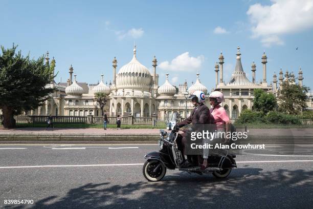 Scooter makes its way past The Royal Pavilion during The Mod Weekender, on August 27, 2017 in Brighton, England. Brighton became the meeting place...