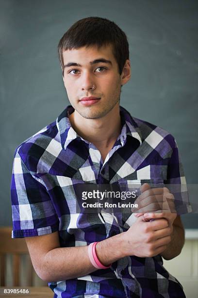 teen boy in classroom, portrait - blackboard qc stock pictures, royalty-free photos & images