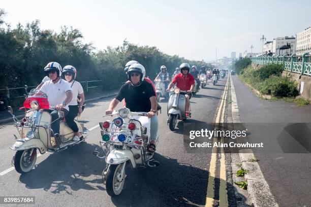 Scooter leave the seafront and make their run out to Peacehaven during The Mod Weekender, on August 27, 2017 in Brighton, England. Brighton became...