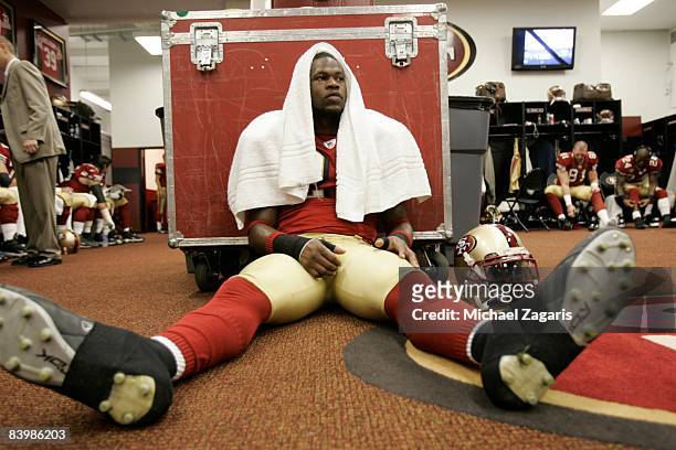 Marcus Hudson of the San Francisco 49ers prepares in the locker room before an NFL football game against the New York Jets at Candlestick Park on...