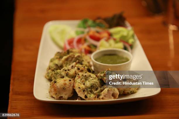 Murgh Mirch Malai Tikka' dish prepared by Chef JP Singh, Executive Chef, Bukhara, ITC Maurya, during the Day 1 of HT City's Culinary Fest, Season...