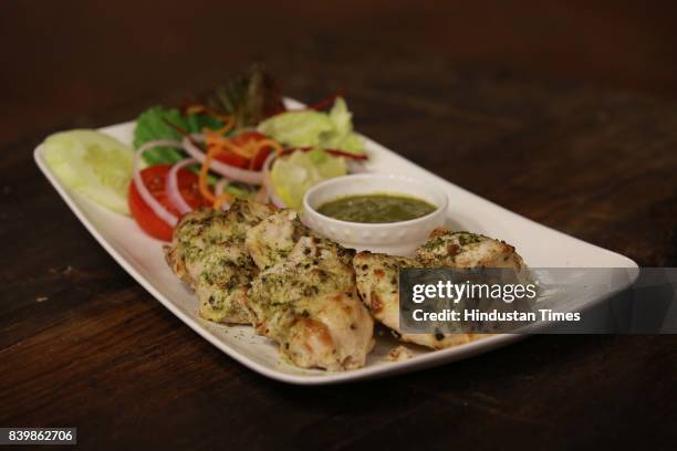 Murgh Mirch Malai Tikka' dish prepared by Chef JP Singh, Executive Chef, Bukhara, ITC Maurya, during the Day 1 of HT City's Culinary Fest, Season...