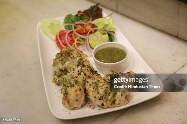 Murgh Mirch Malai Tikka' dish prepared by Chef JP Singh, Executive Chef, Bukhara, ITC Maurya, during the Day 1 of HT City's Culinary Fest, Season...