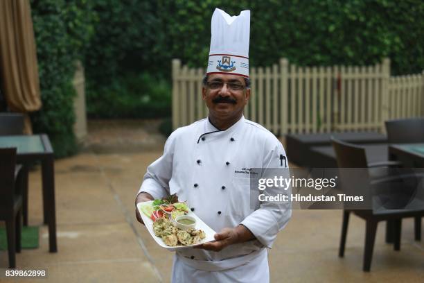 Chef JP Singh, Executive Chef, Bukhara, ITC Maurya, prepares 'Murgh Mirch Malai Tikka' during the Day 1 of HT City's Culinary Fest, Season III, at...