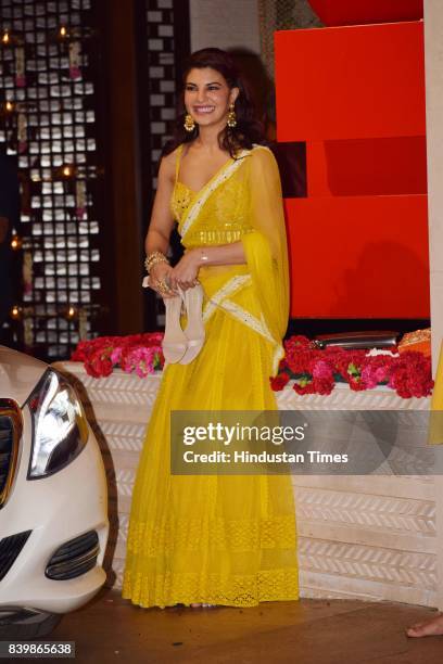 Bollywood actor Jacqueline Fernandez during the Ganesh Puja hosted by Mukesh Ambani, Chairman of Reliance Industries Ltd. , at his residence to...