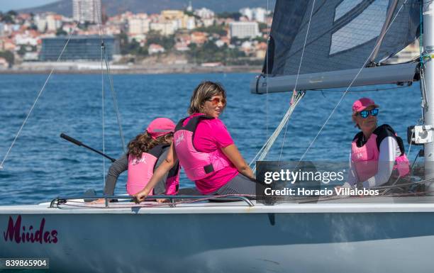 All female crew of "Miudas" wait for the start of an SB20 Class regatta in Cascais Bay, part of the city's Sea Festivities, on August 27, 2017 in...