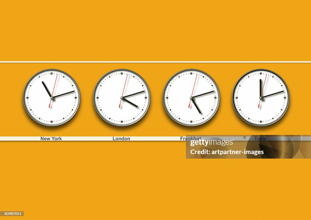 4 wall clocks with different timezones