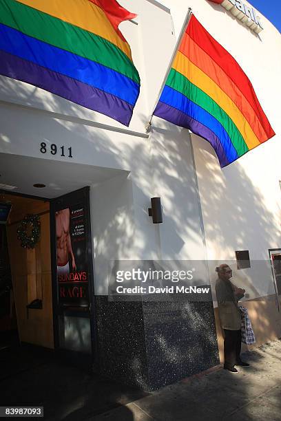 Rainbow flags fly from the Rage gay bar in the heart of a gay-friendly section of Santa Monica Boulevard which remains open during Day Without a Gay...