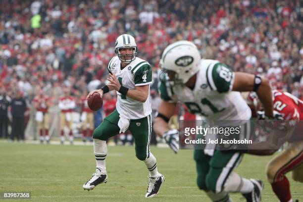 Quarterback Brett Favre of the New York Jets runs to pass the ball against the San Francisco 49ers during an NFL game on December 7, 2008 at...