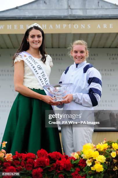 Rose Of Tralee's Jennifer Byrne presents winning jockey Maxine O'Sullivan with her prize after The Tipperary Crystal Rose Ladies Invitational...