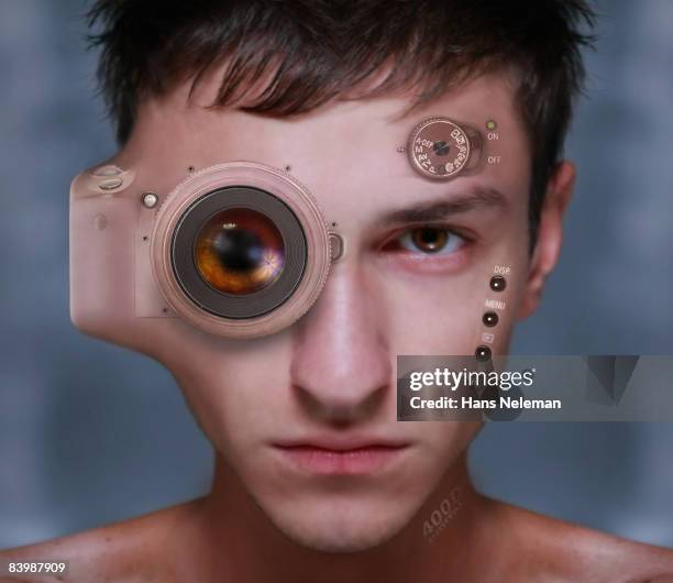 a young man with a camera embedded in his face - white morph stock pictures, royalty-free photos & images