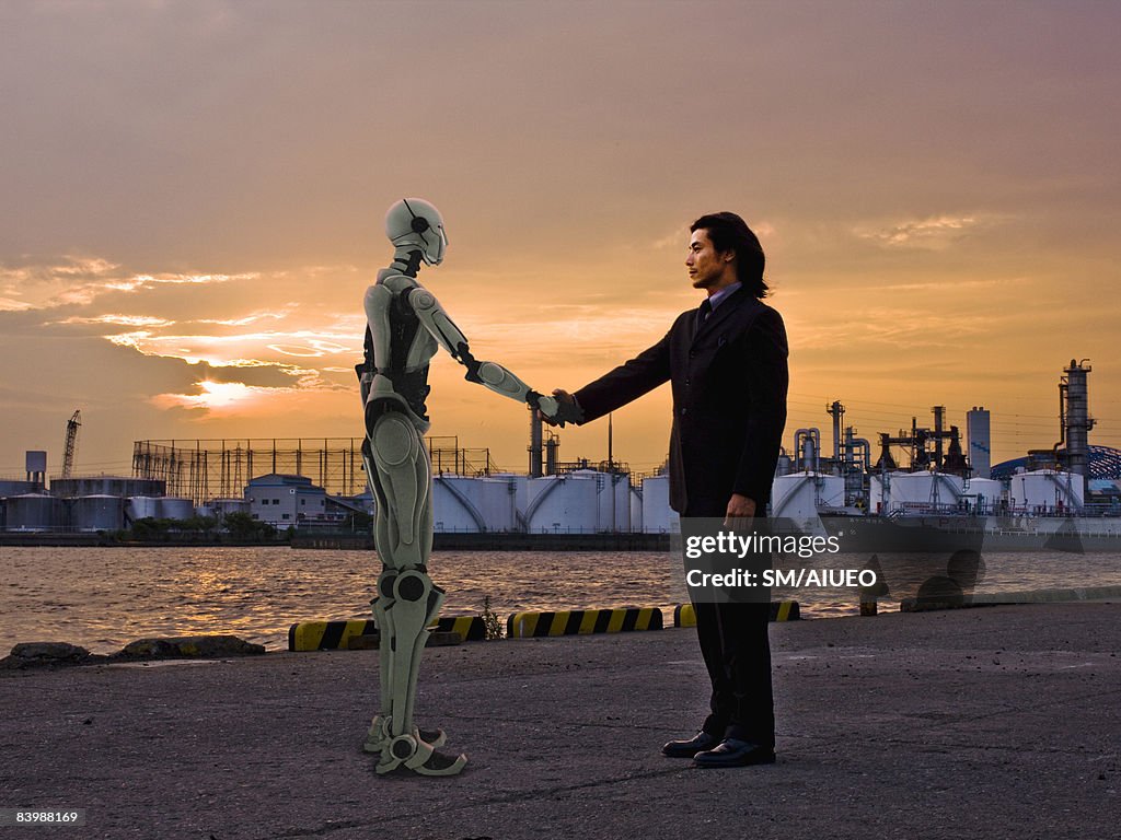 Robot and man gretting at the port