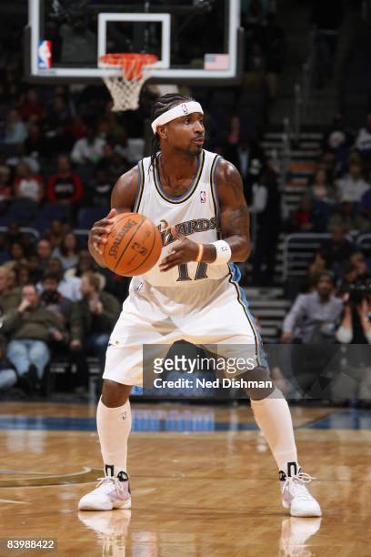 Dee Brown of the Washington Wizards looks to move the ball against the Houston Rockets during the game at the Verizon Center on November 21, 2008 in...