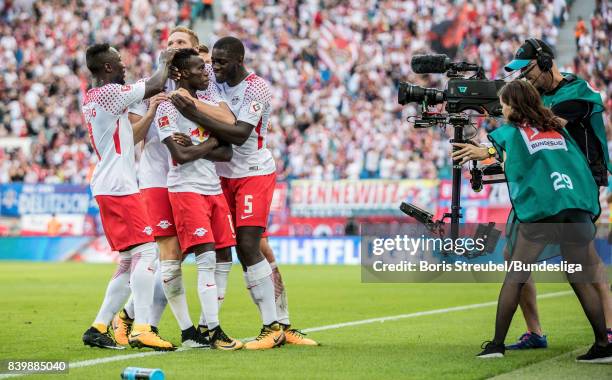 Bruma of RB Leipzig celebrates with team mates after scoring his team's fourth goal during the Bundesliga match between RB Leipzig and Sport-Club...