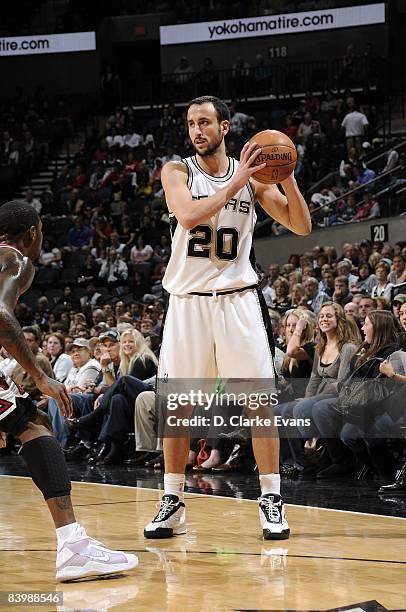 Manu Ginobili of the San Antonio Spurs looks to move the ball against the Chicago Bulls during the game on November 26, 2008 at the AT&T Center in...