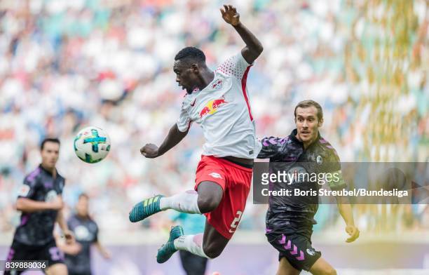 Jean-Kevin Augustin of RB Leipzig controls the ball during the Bundesliga match between RB Leipzig and Sport-Club Freiburg at Red Bull Arena on...